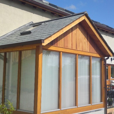 Ken O'Brien Carpentry and Building - Wood sun room with slate roof